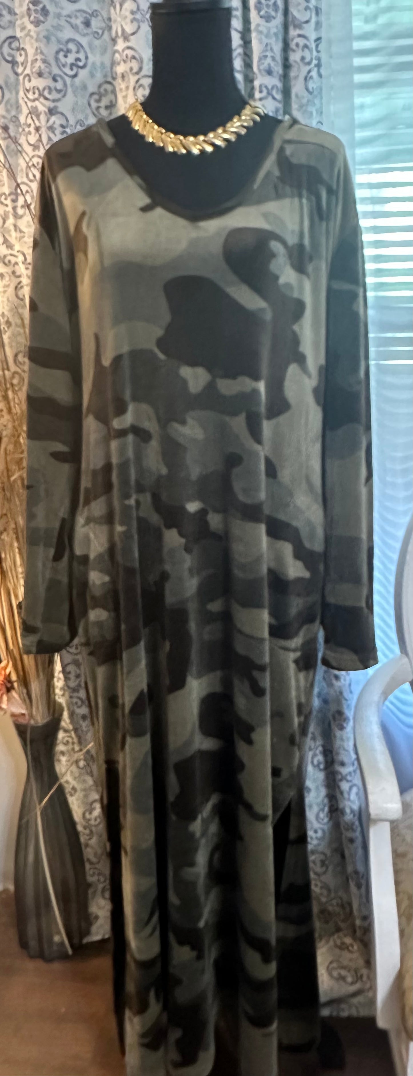 Size 22/24 camo can be worn as gown or belted and worn as a dress. Has pockets