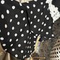 Size small black and white polka dot NWT blouse