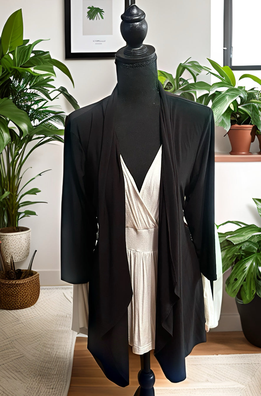 Size XL ivory top and 3/4 sleeve black open top/cardigan both fit like a large