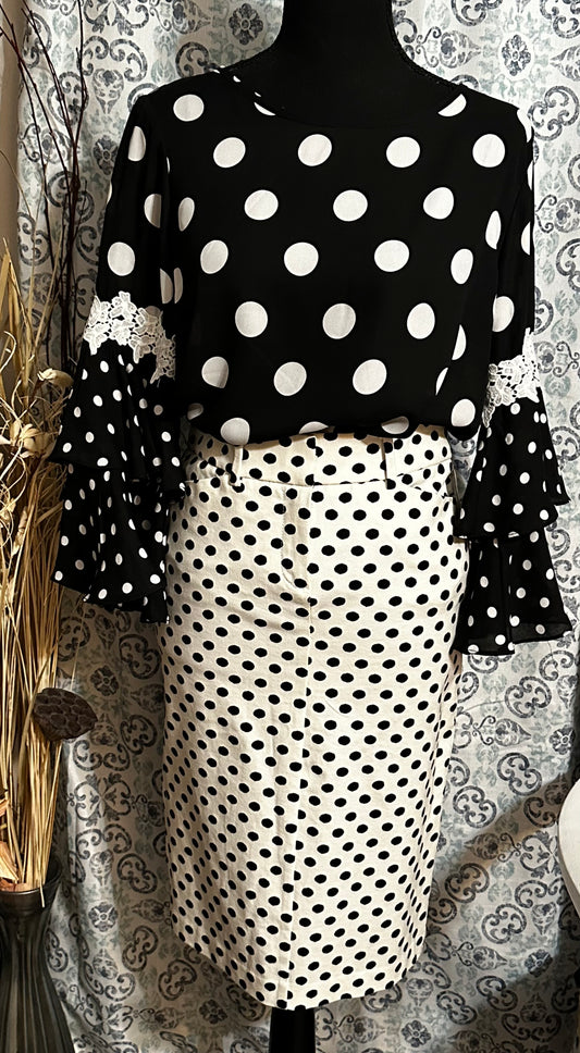 Size small black and white polka dot NWT blouse