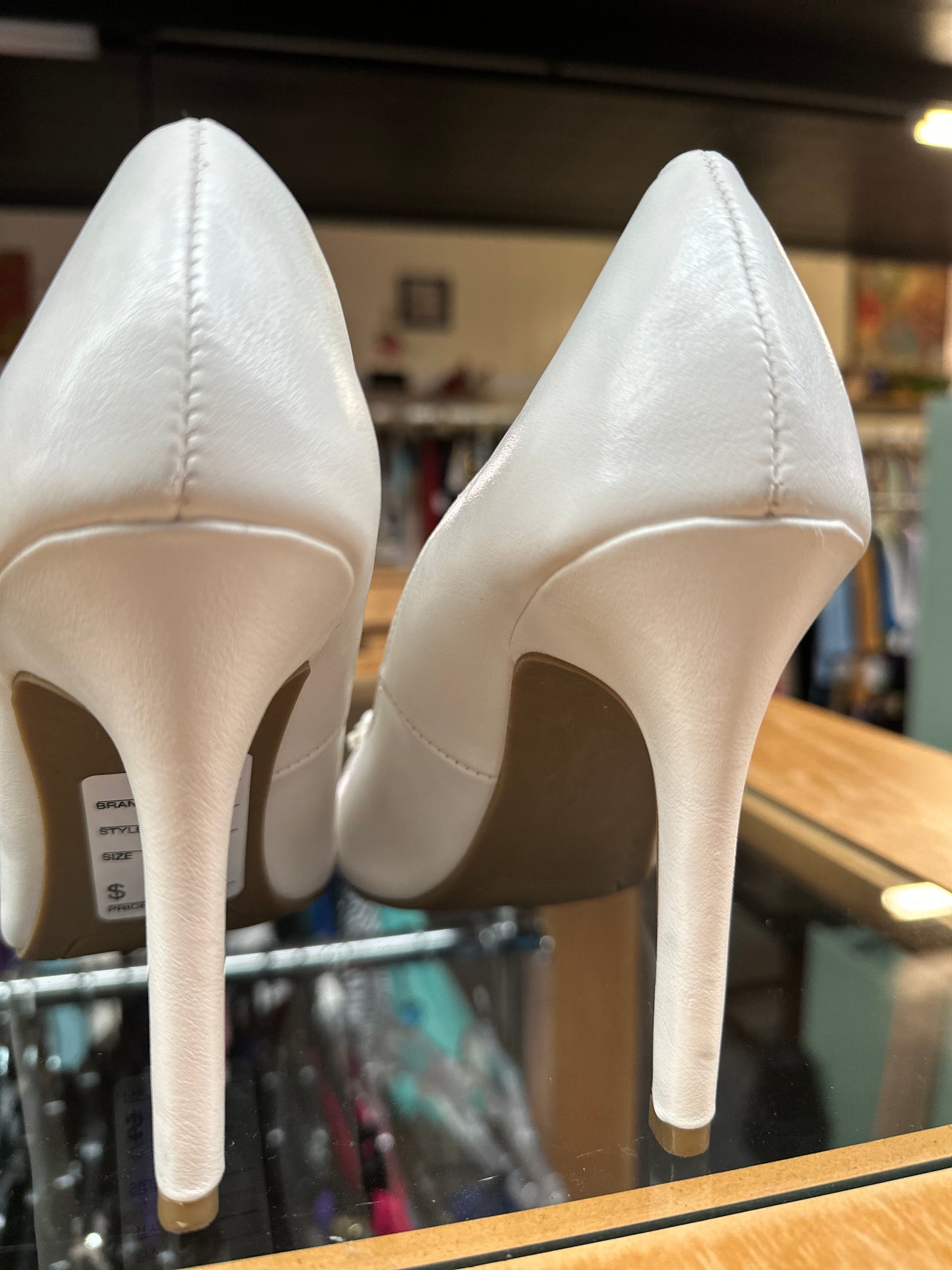 Size 8 white pumps with flowers