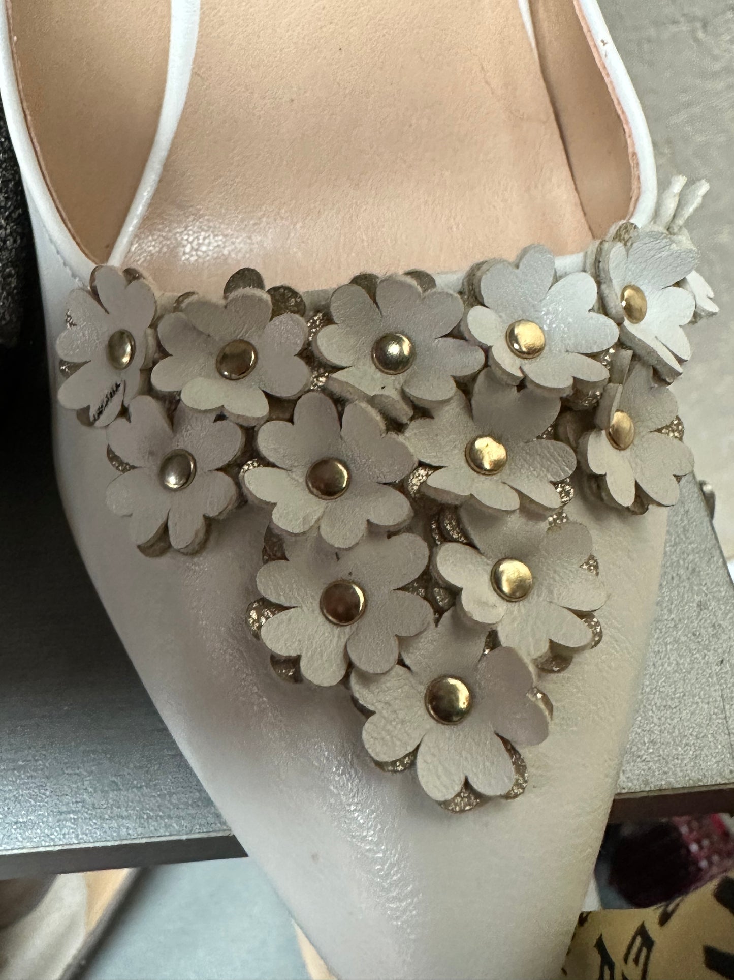 Size 8 white pumps with flowers