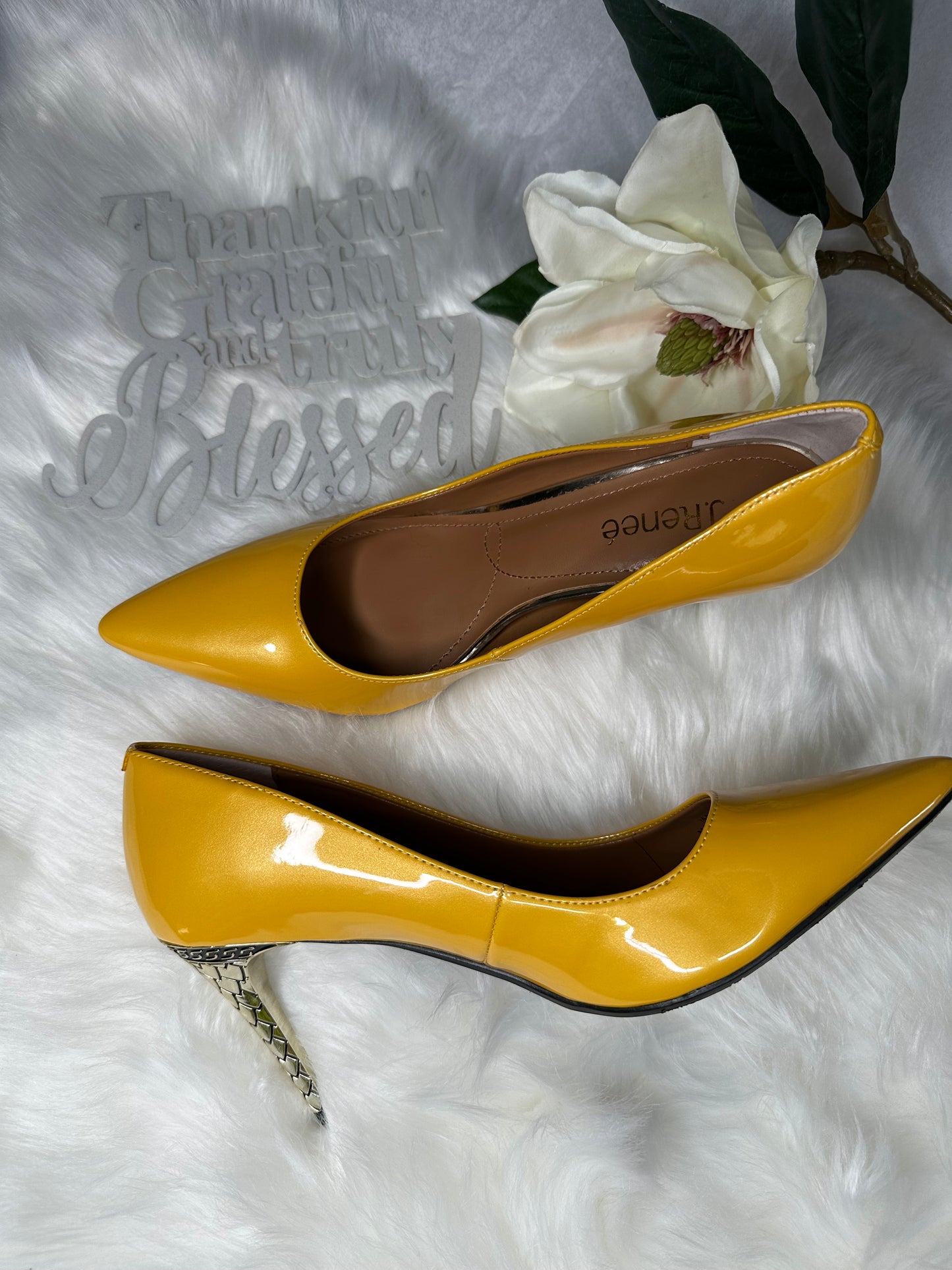 Size 9.5M Maressa pumps with a pearlized upper and look-at-me heels. Form J. Renee.