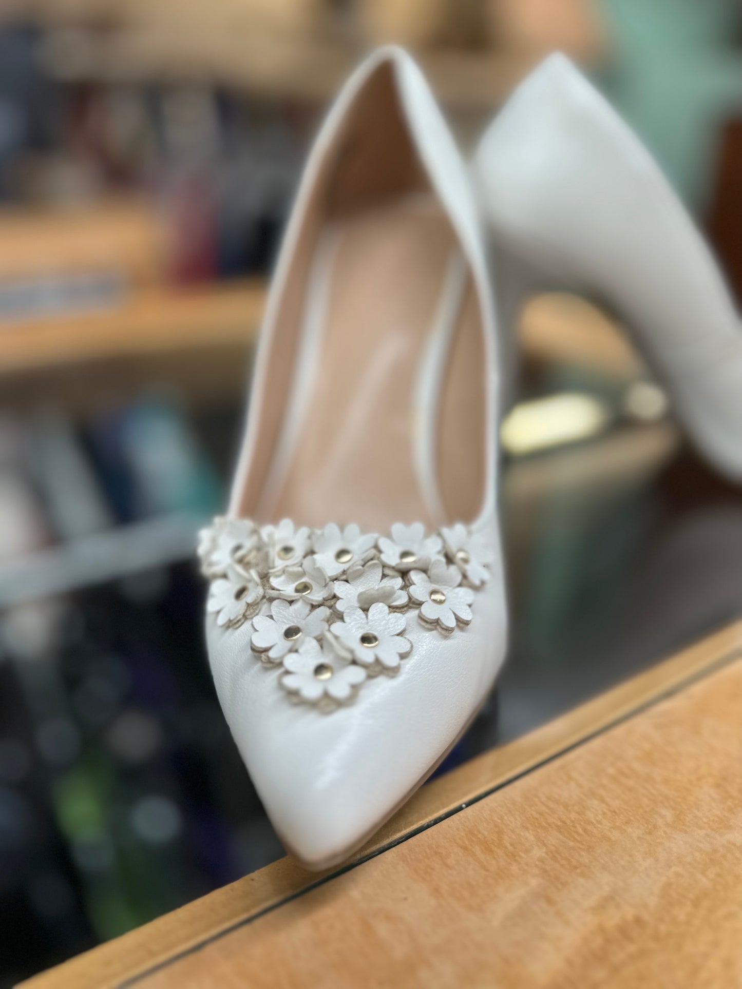 Size 8 white pumps with flowers