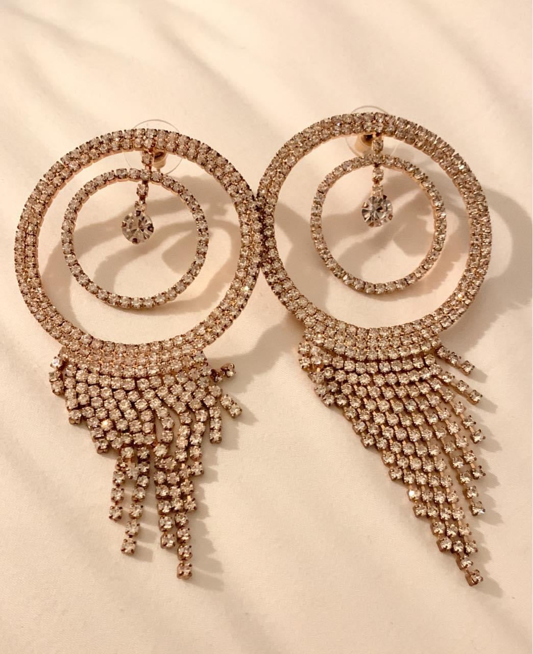 Gold and rhinestone earrings