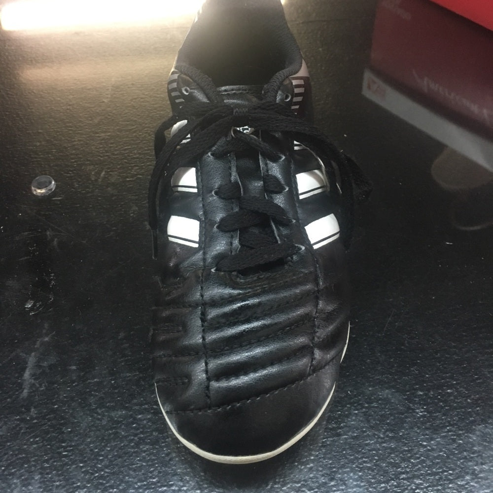 Black and white Adidas size 2y cleats