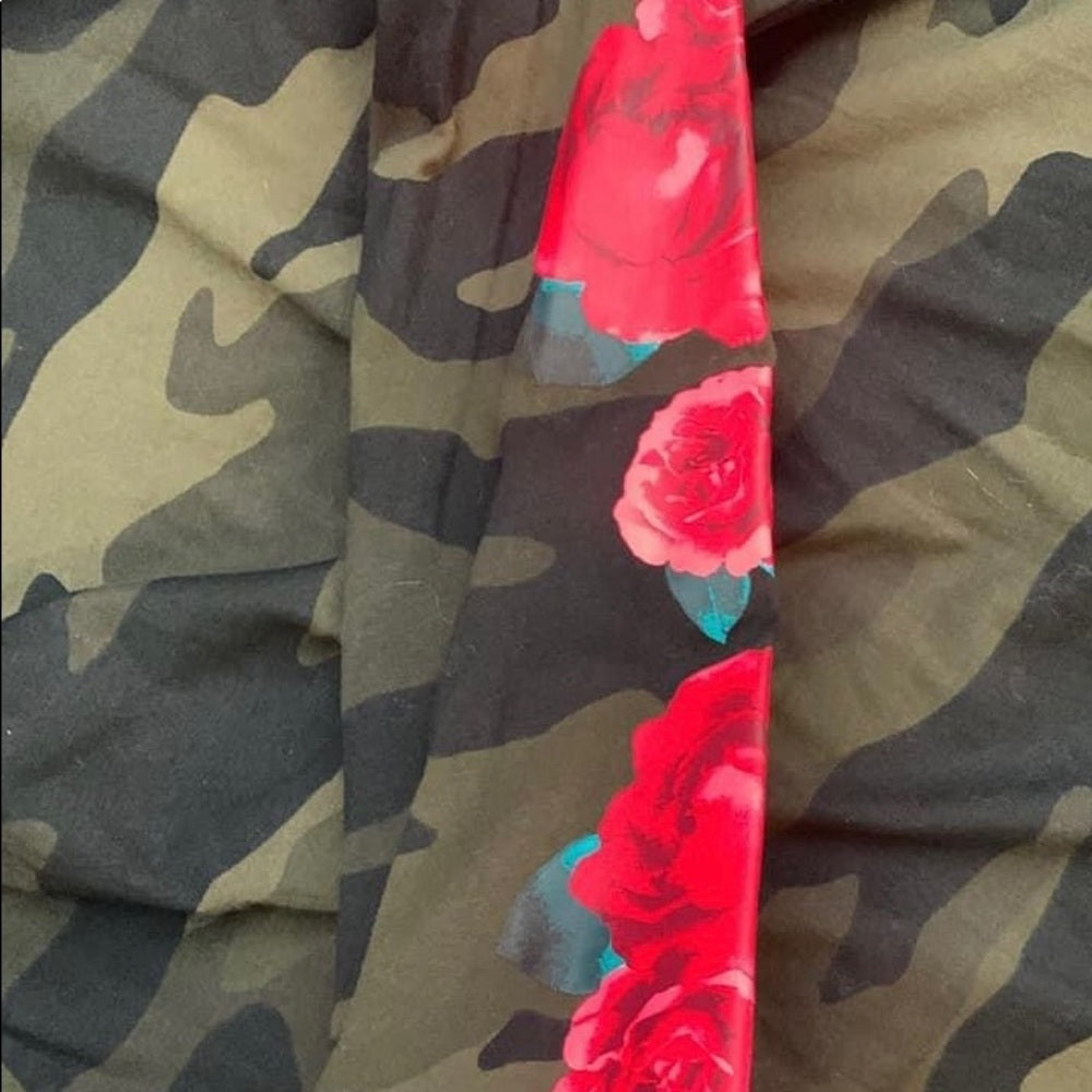 Size XS camo long sleeve tshirt with roses on the sleeve